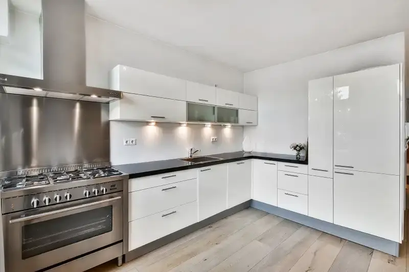 Freshly renovated Tampa kitchen and living space with smooth walls and new paint