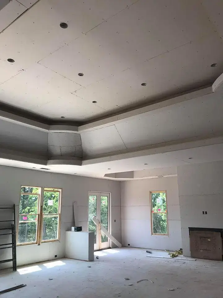Tampa room cleared and covered with plastic sheeting ahead of drywall installation