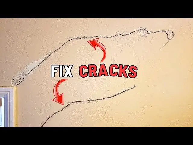 Hairline crack running across an old plaster wall